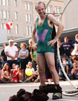 Dominique Major performing a coin spin in her German Wheel